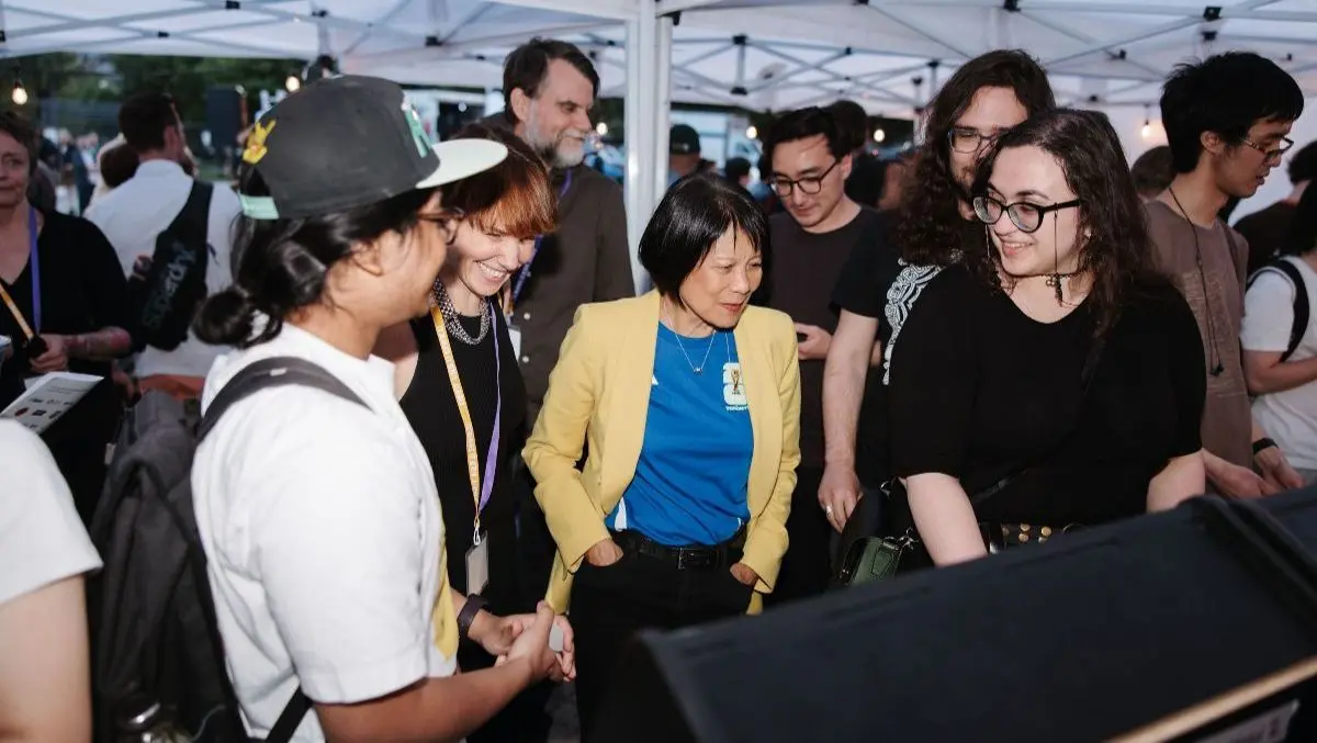Toronto Mayor Olivia Chow viewing the game demo station among attendees at Giant Games.