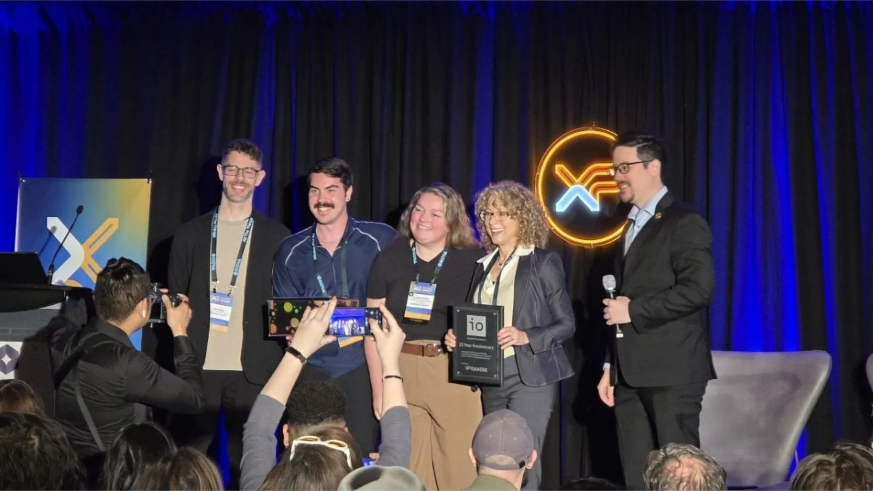 Interactive Ontario receiving a commemorative 25th anniversary plaque at XP Game Summit 2026